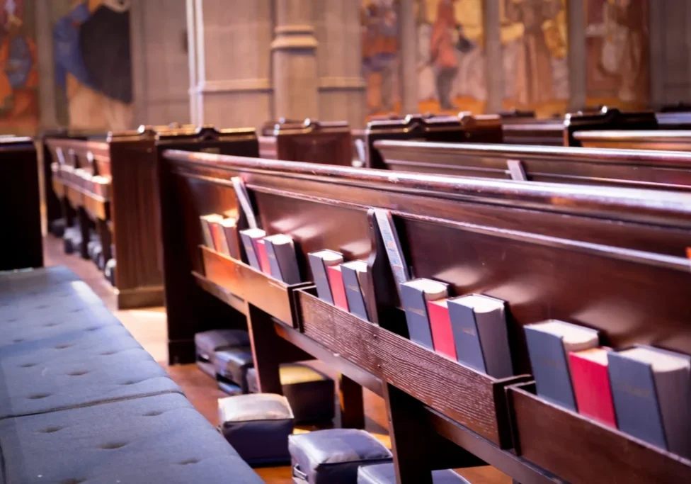 Bibles placed in order behind chairs